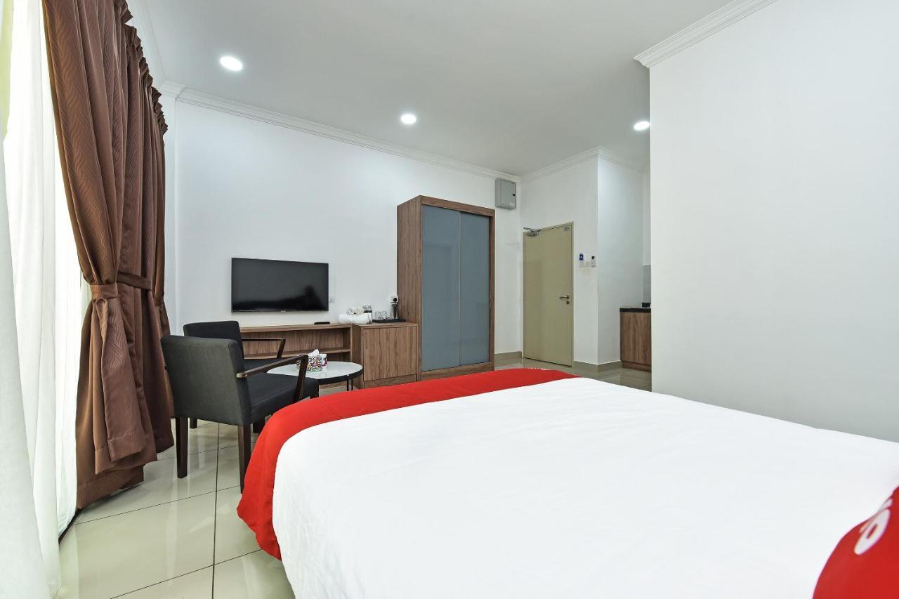 Capital O 90614 Cvia Ummul Hotel Паданг-Бесар Екстер'єр фото